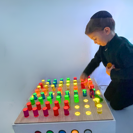 TABLE TOP PANEL WITH COLOURED RODS