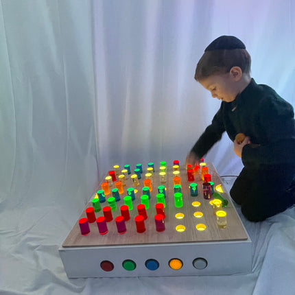 TABLE TOP PANEL WITH COLOURED RODS
